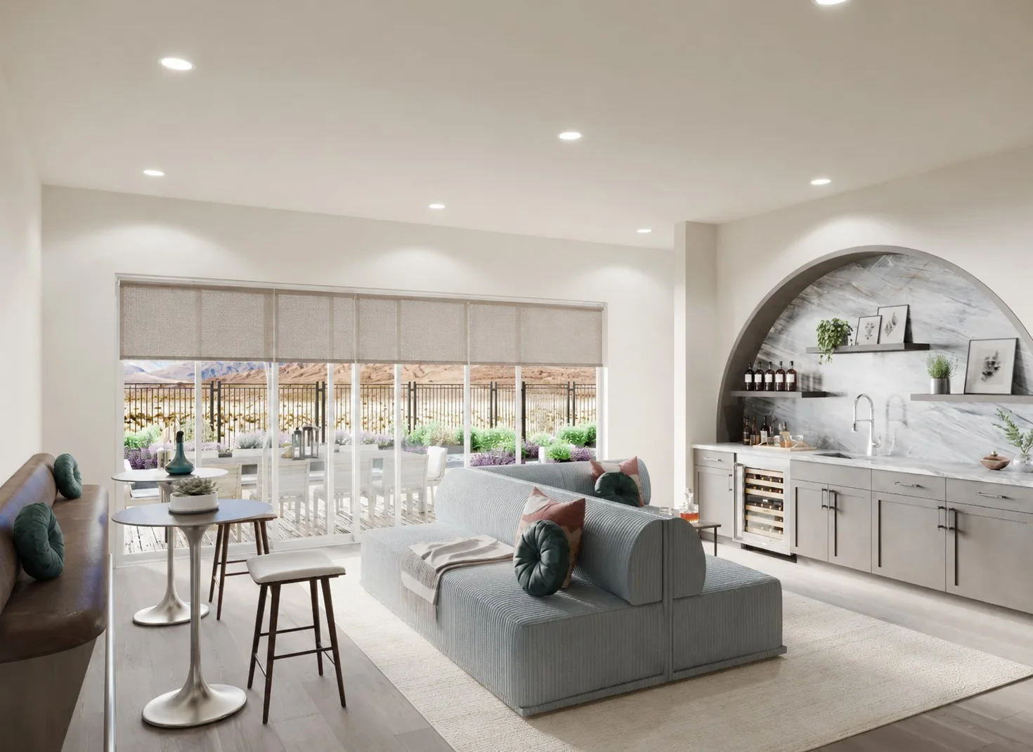 Roller shades in a bright family room with sliding doors